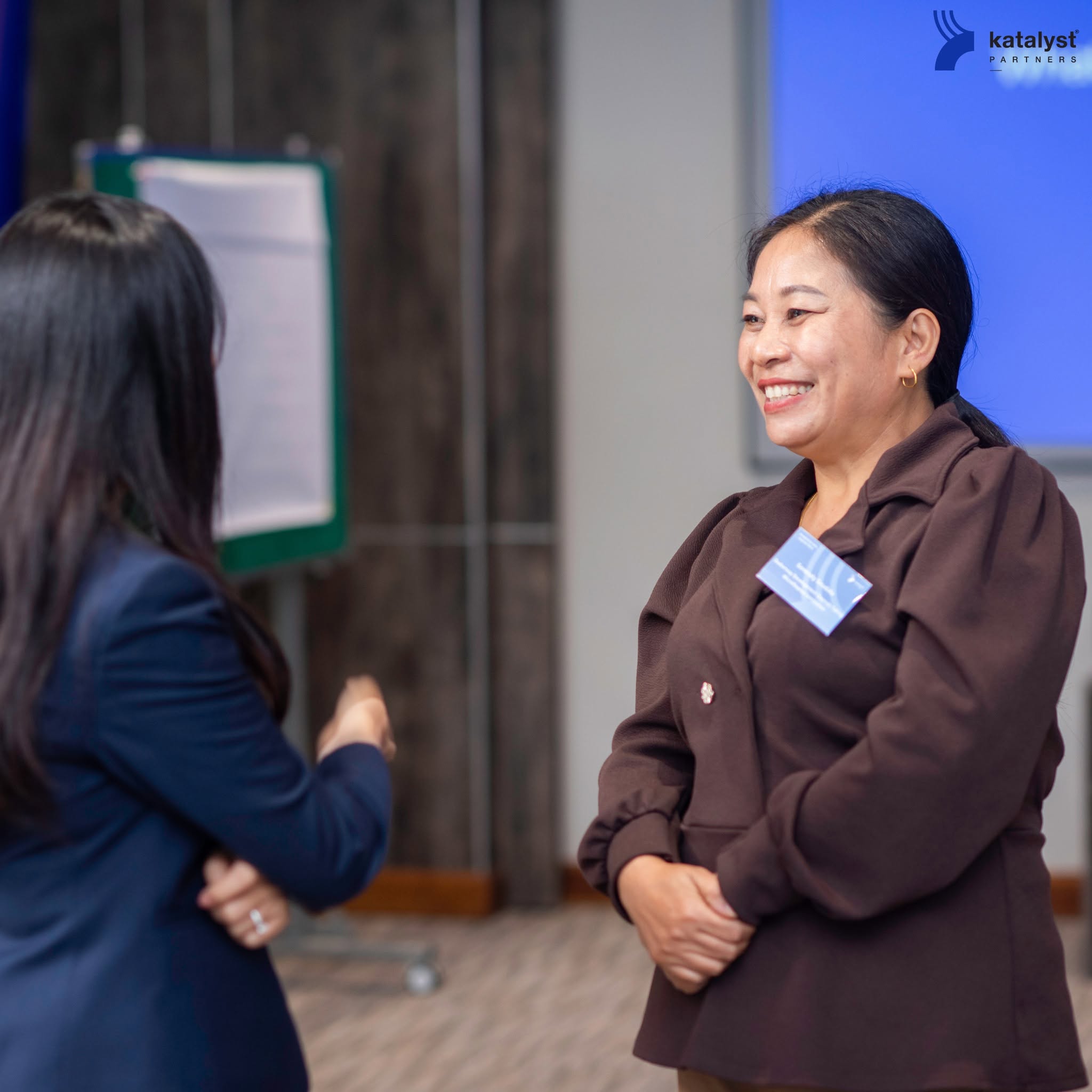 Two managers practicing a workplace conversation during a Katalyst program