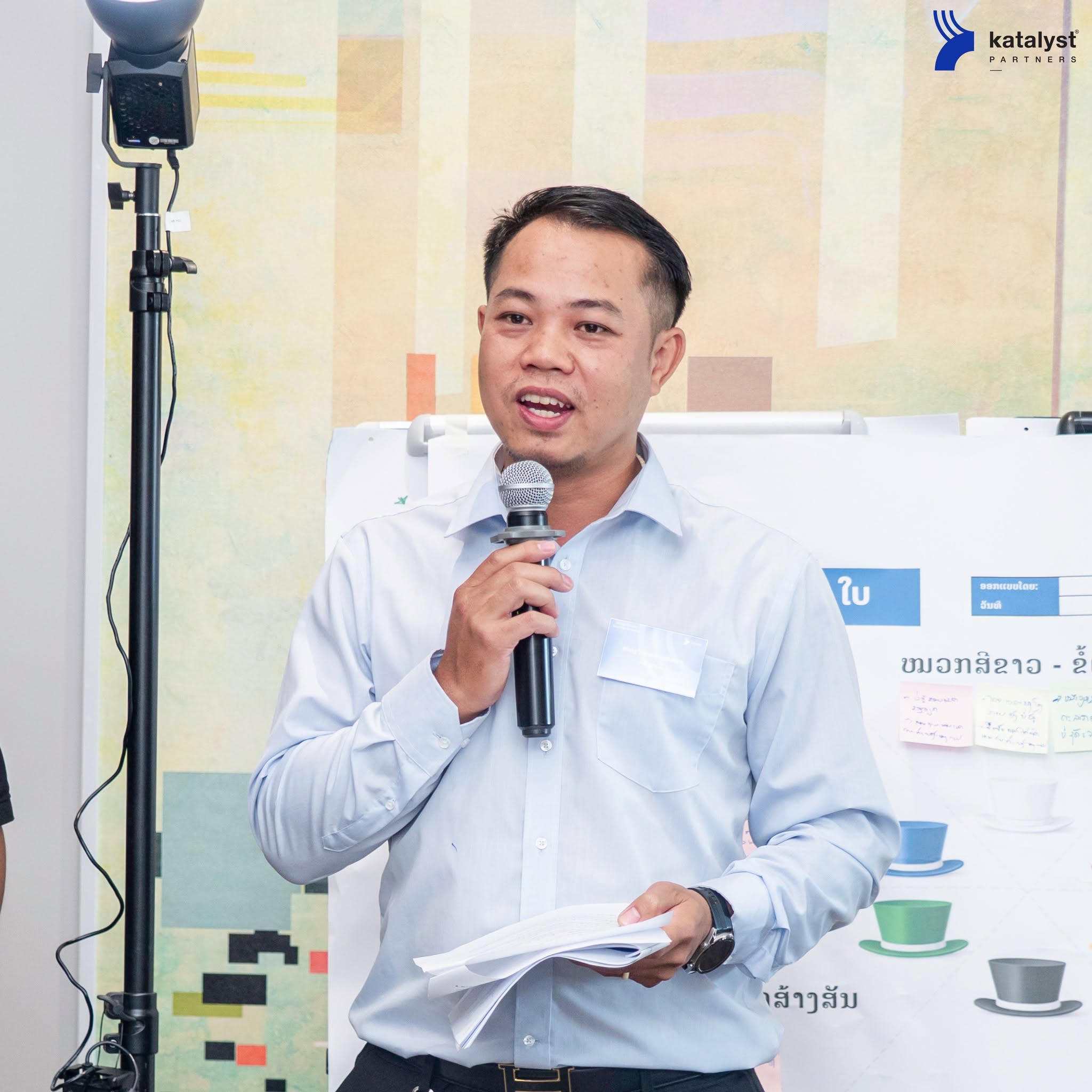 Participant presenting during a Katalyst public workshop