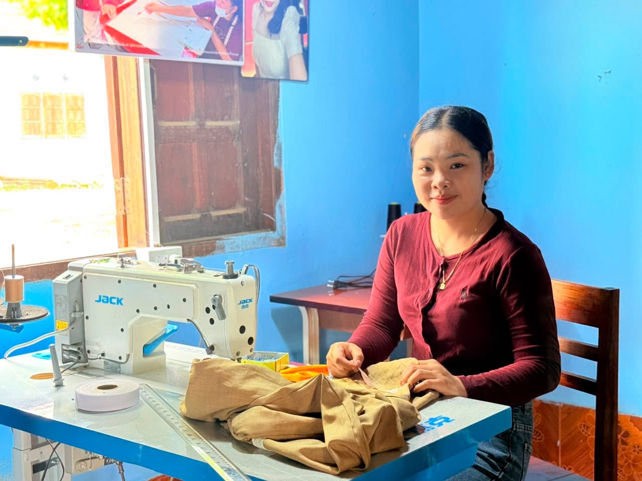 A young entrepreneur working at her sewing machine