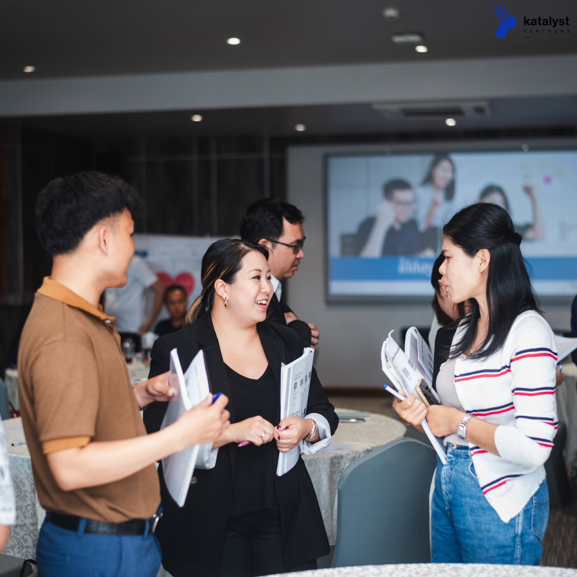 B-Strong entrepreneurs sharing ideas during a workshop