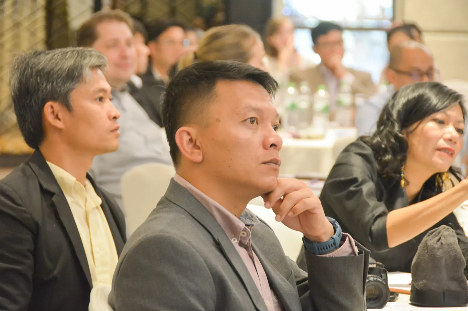Participants listening and contributing during the in-person e-commerce consultation