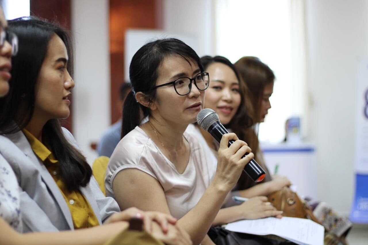 A participant contributing to an executive learning discussion