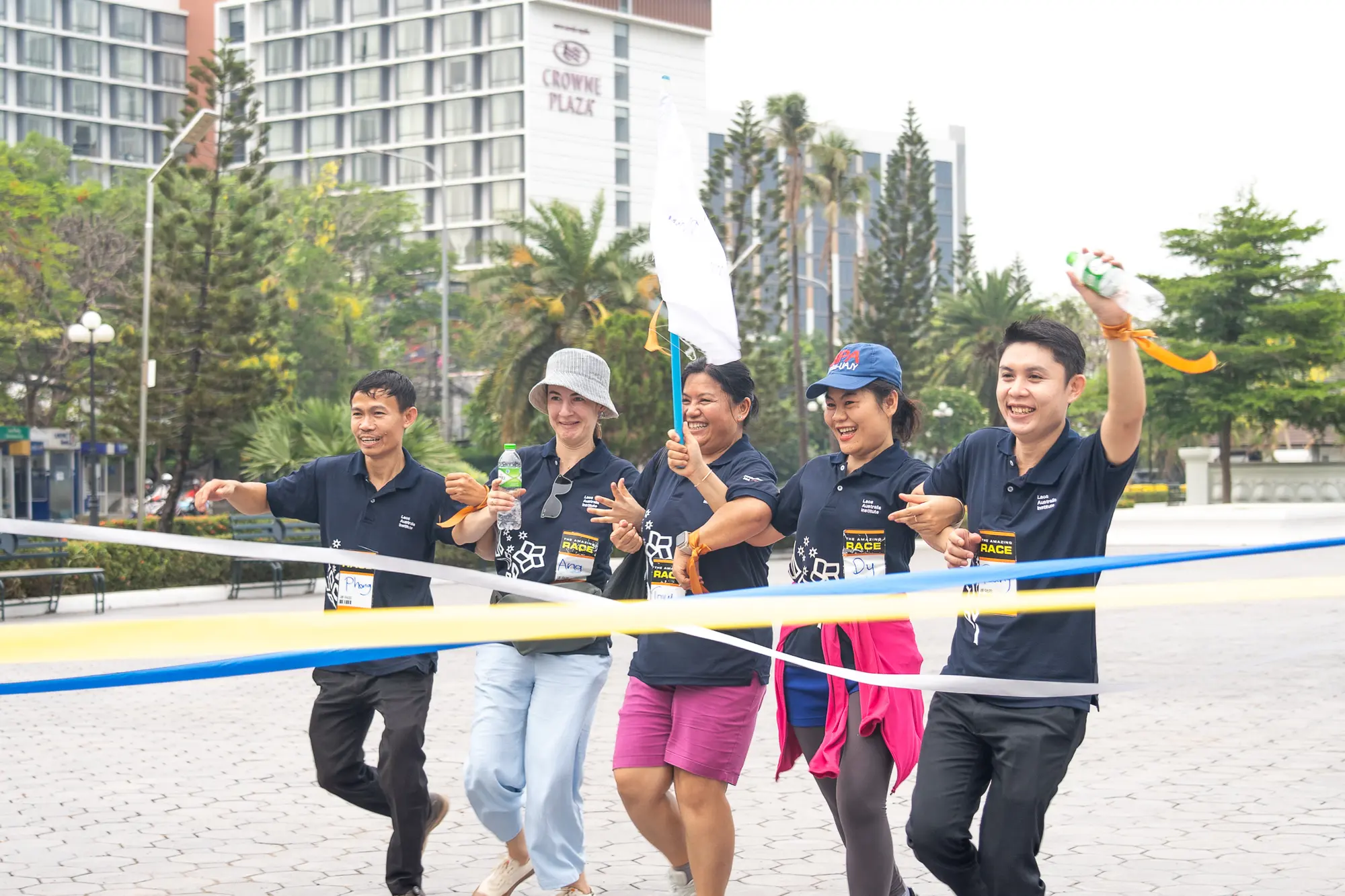 A team racing together through a challenge in Vientiane